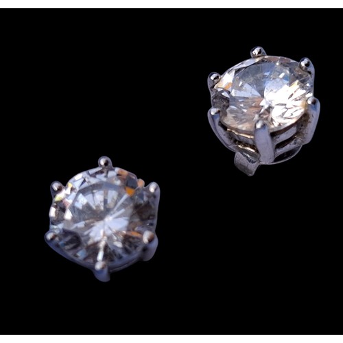 241 - A PAIR OF SILVER SOLITAIRE EARRINGS