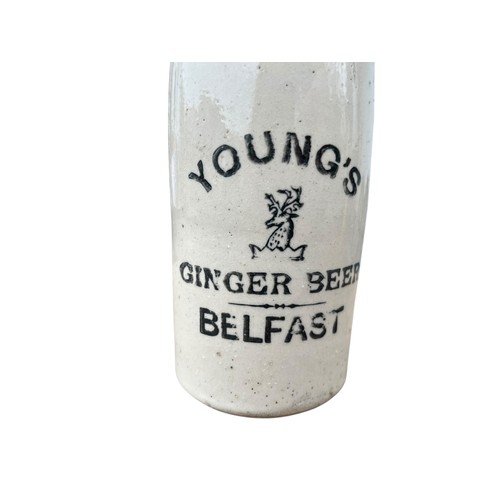 251 - A YOUNG'S GINGER BEER BELFAST STONEWARE BOTTLE (DAMAGE TO RIM AS PER PHOTO)