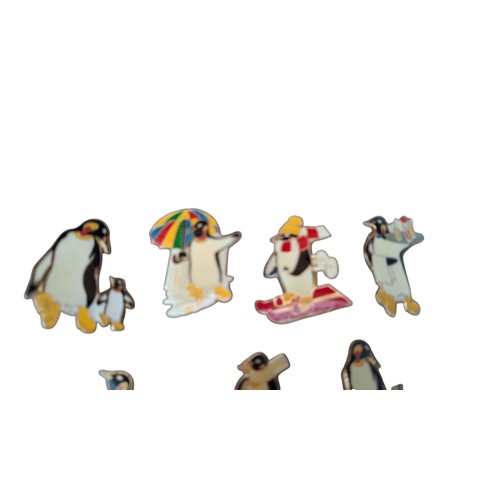 255 - A COLLECTION OF BADGES