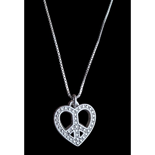 279 - A SILVER HEART FOB ON SILVER CHAIN