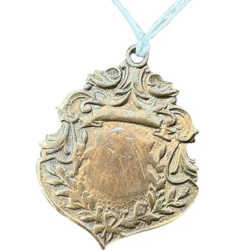 280 - A GOLD PLATED MEDAL