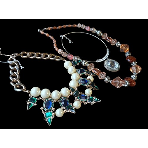 259 - 3 COSTUME NECKLACE 2 LARGE BEADED AND A CHOKER TYPE