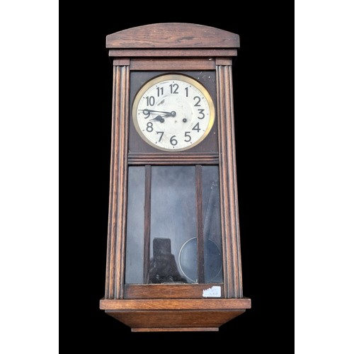 110A - A VINTAGE STYLE OAK CASE WALL CLOCK