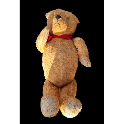 61 - AN ANTIQUE TEDDY BEAR