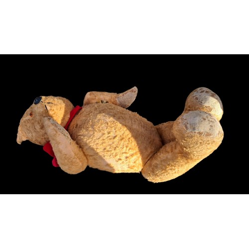61 - AN ANTIQUE TEDDY BEAR