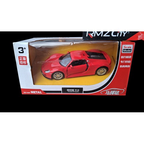 65 - 3 DIE CAST BOXED CARS PORSHE 918 SPYDER, PORSCHE 911, VOLKSWAGON GOLF GTI