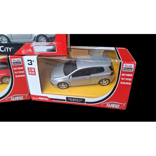 65 - 3 DIE CAST BOXED CARS PORSHE 918 SPYDER, PORSCHE 911, VOLKSWAGON GOLF GTI