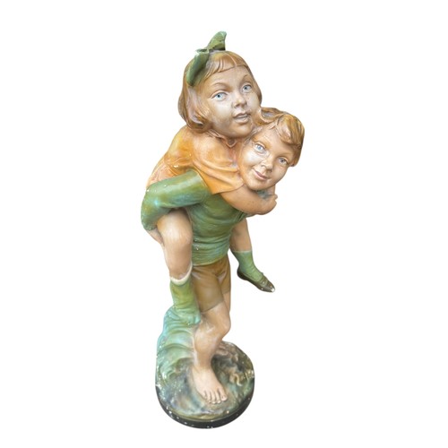 96 - A LARGE HAND PAINTED PARIAN BOY AND GIRL GROUP WITH SOME AGE STANDS 20