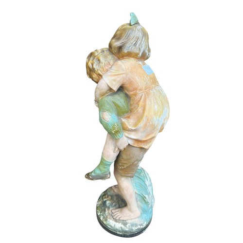 96 - A LARGE HAND PAINTED PARIAN BOY AND GIRL GROUP WITH SOME AGE STANDS 20