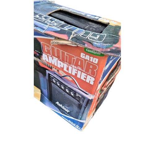 99 - A NEW BOXED GUITAR AMP