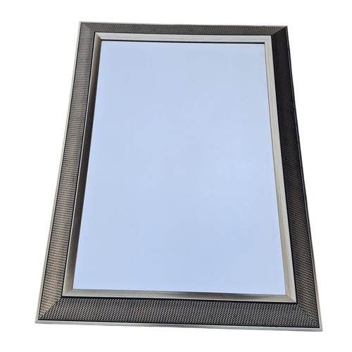 118 - A DESIGNER STYLE METAL FRAMED MIRROR 36