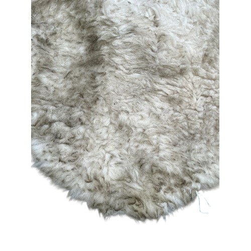 103 - A SHEEP SKIN RUG