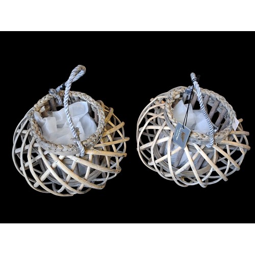 45 - 2 NEW WICKER CANDLE HOLDERS