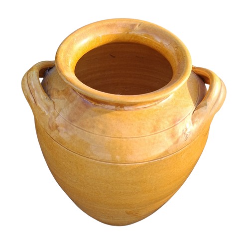 49 - A MUSTARD COLOURED GLAZED POTTERY VASE