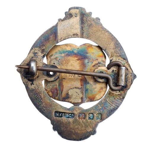 301 - A 1926 SILVER AND ENAMEL BADGE