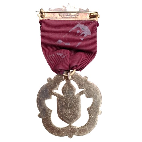 311 - A MASONIC MEDAL DATED 1954