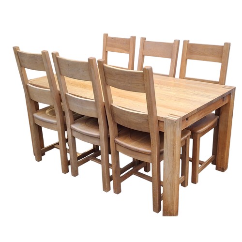 330 - A GOOD OAK DINING TABLE AND 6 CHAIRS