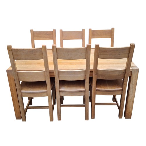 330 - A GOOD OAK DINING TABLE AND 6 CHAIRS