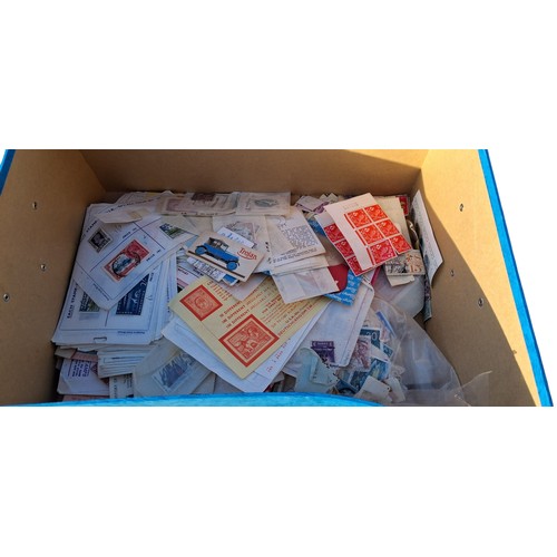 335 - A BOX OF COLLECROS STAMPS