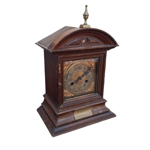 338 - A BRASS DIAL MANTLE CLOCK