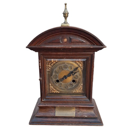 338 - A BRASS DIAL MANTLE CLOCK