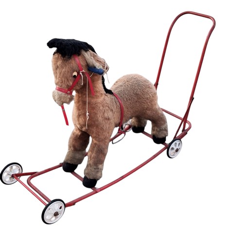86 - A VINTAGE PUSH ALONG ROCKING HORSE