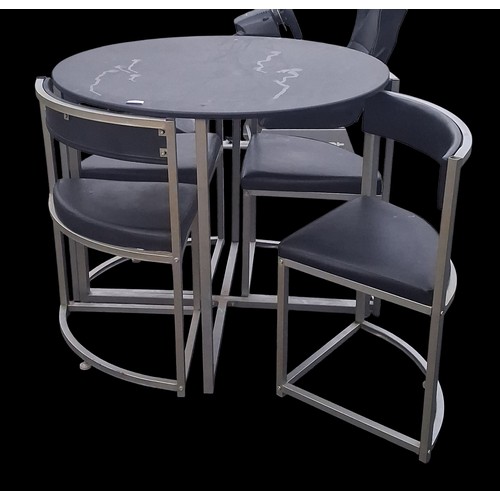 95 - A CIRCULAR TABLE WITH 4 FITTED CHAIRS
