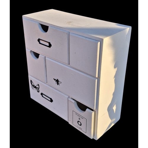 96 - A NEAT ORGANISING CHEST OF DRAWERS
