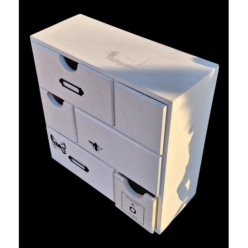 96 - A NEAT ORGANISING CHEST OF DRAWERS