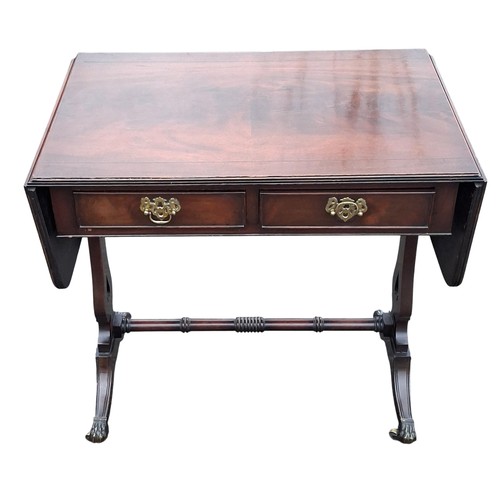 105 - A MAHOGANY SOFA TABLE