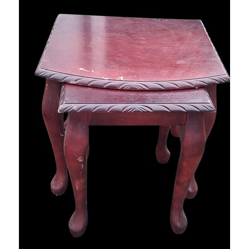 79 - A MAHOGANY NEST OF TABLES