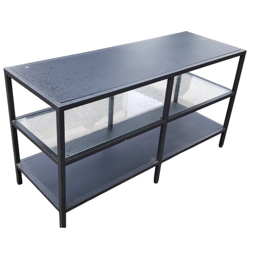 84 - AN EBONY AND GLASS TABLE
