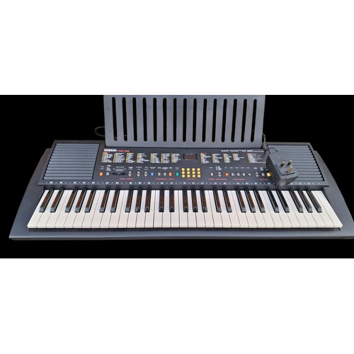 89 - A YAMAHA PSR 82 KEY ELECTRIC PIANO IN PWO