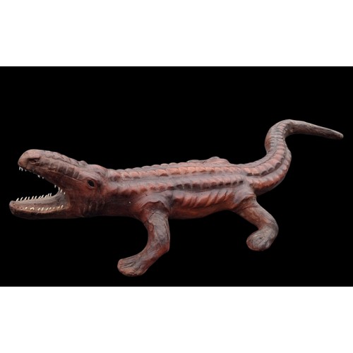 90 - A LARGE LEATHER CROCODILE