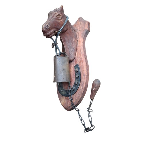 94 - AN EQUESTRIAN THEMED WALL MOUNTED BELL