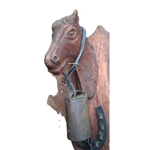 94 - AN EQUESTRIAN THEMED WALL MOUNTED BELL