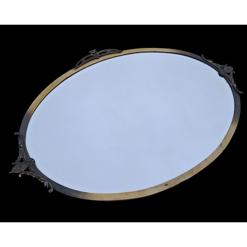 97 - A MID CENTURY BRASS FRAMED MIRROR