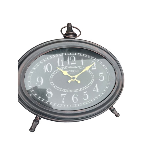 103 - A NEW BLACK AND CHROME CLOCK AND A NEW MANTLE CLOCK