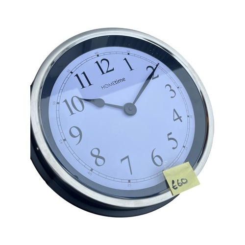 103 - A NEW BLACK AND CHROME CLOCK AND A NEW MANTLE CLOCK