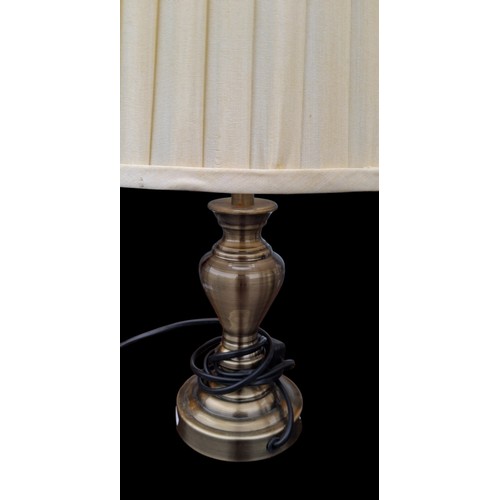 62 - A PAIR OF BRONZED FINISHED LAMPS