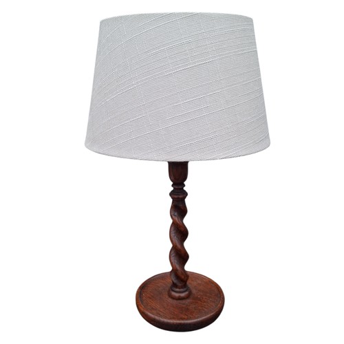 118 - A VINTAGE OAK BARLEY TWIST TABLE LAMP