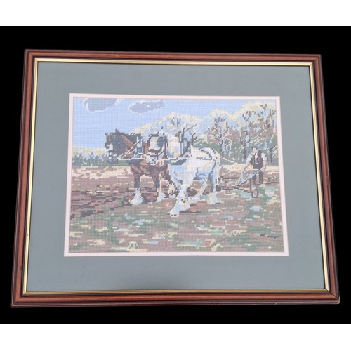 316 - A FRAMED TAPESTRY