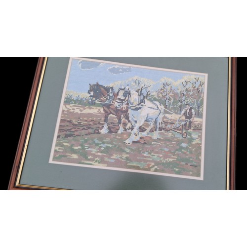 316 - A FRAMED TAPESTRY