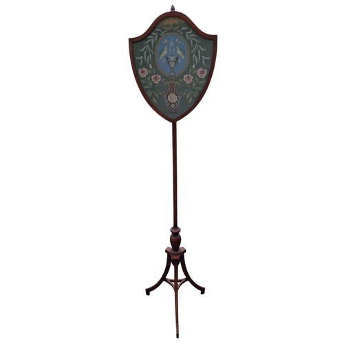 323 - A REGENCY SHIELD SHAPE TAPESTRY POLESCREEN OF FINE QUALITY