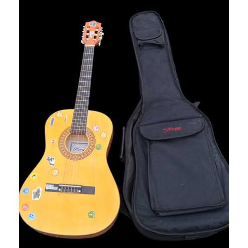 324 - A 3/4 SIZE GUITAR IN CASE (MARKERS NAME ON INSIDE)