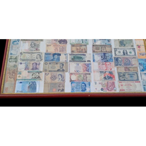 342 - A GENUINE FRAMED BANKNOTES FRPM ACROSS THE GLOBE