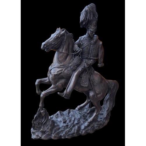 81 - 2 BRONZED FINISH LIGHT BRIGADE ORNAMENTS TALLEST 12