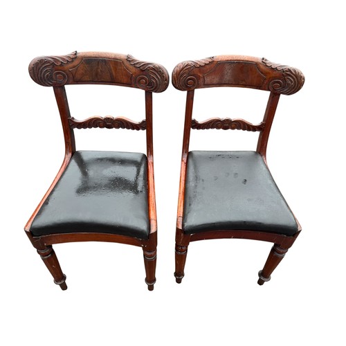 137 - A PAIR OF HEAVILY CARVED GEORGIAN SIDE CHAIRS