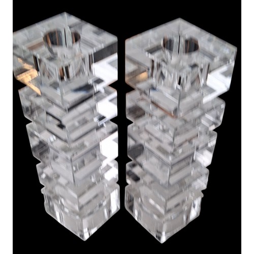 328 - A PAIR OF CRYSTAL CANDLE HOLDERS
