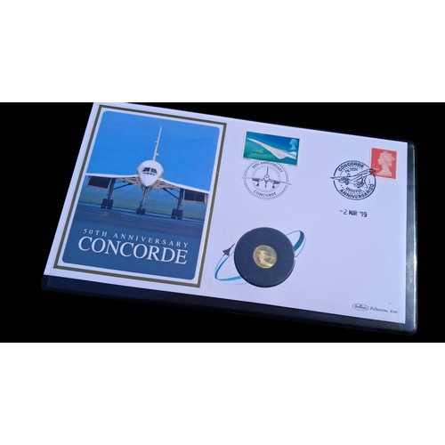663 - A LIMITED EDITION 9CT GOLD COIN 50TH ANNIVERSARY OF CONCORDE WITH PAPERS AND SLEEVE